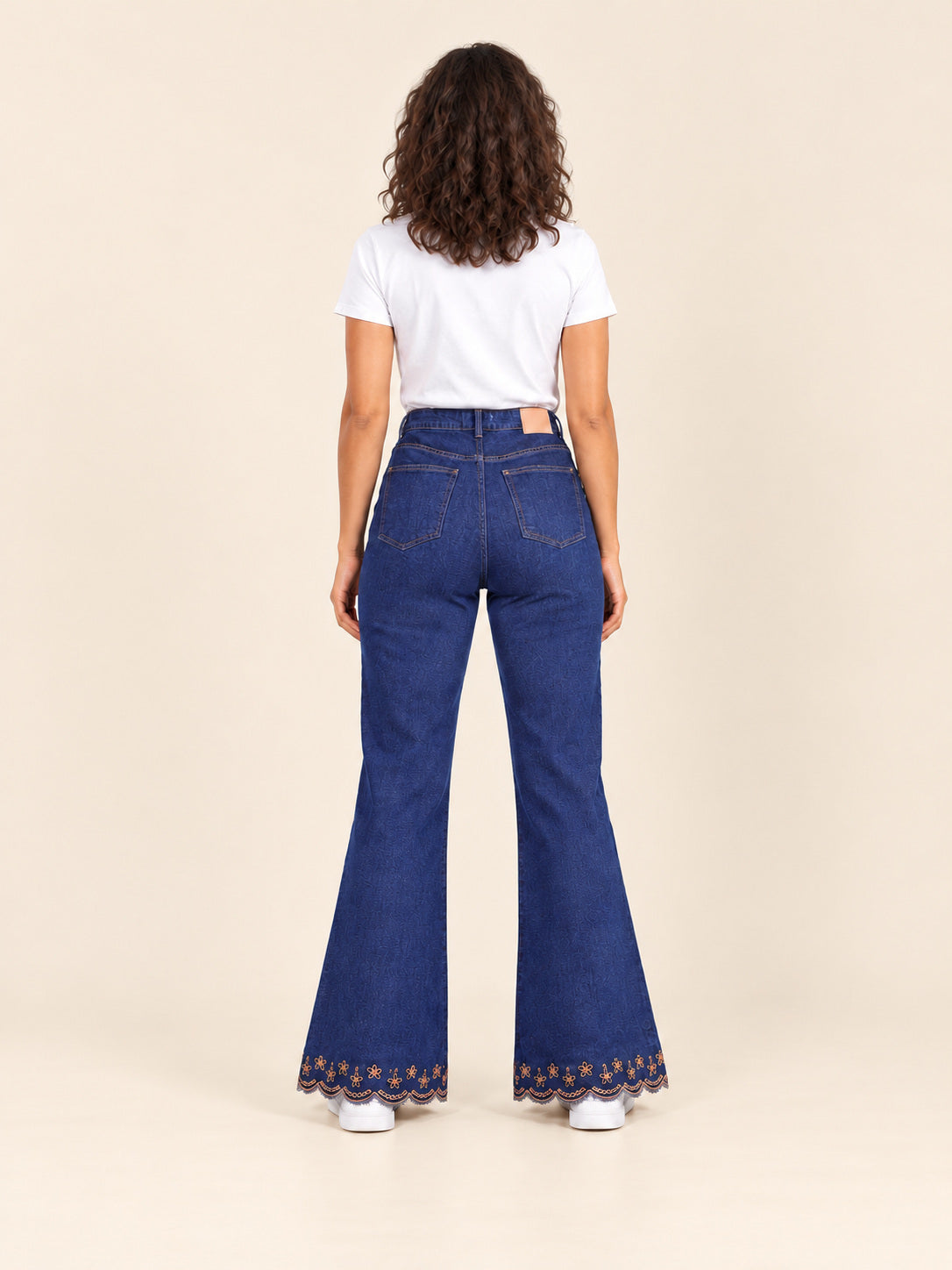 Embroidered Hem Flare Jeans — Indigo